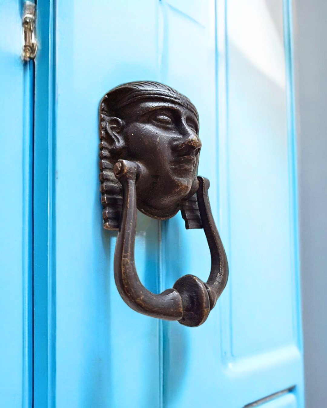 Close-up of 6.7in bronze door knocker with Egyptian Pharaoh design