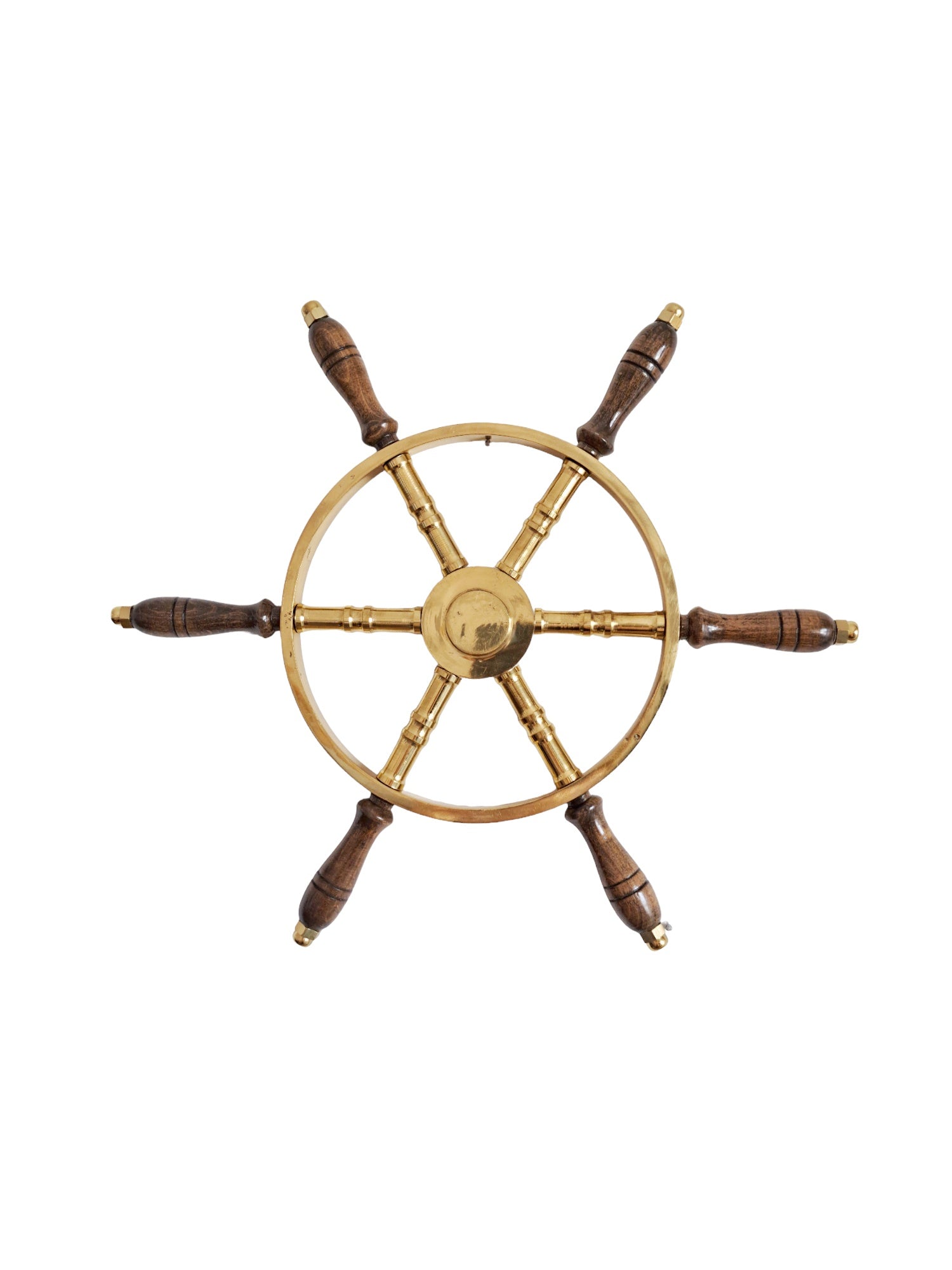 Nautical steering wheel with brass center and wooden spokes on a white background