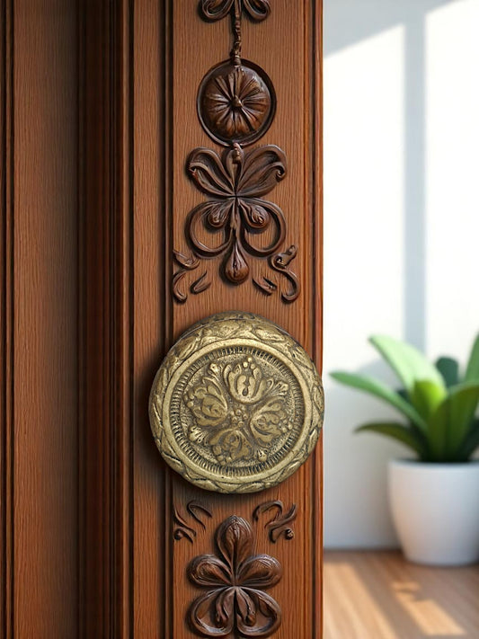 Brass door knob on a wooden door