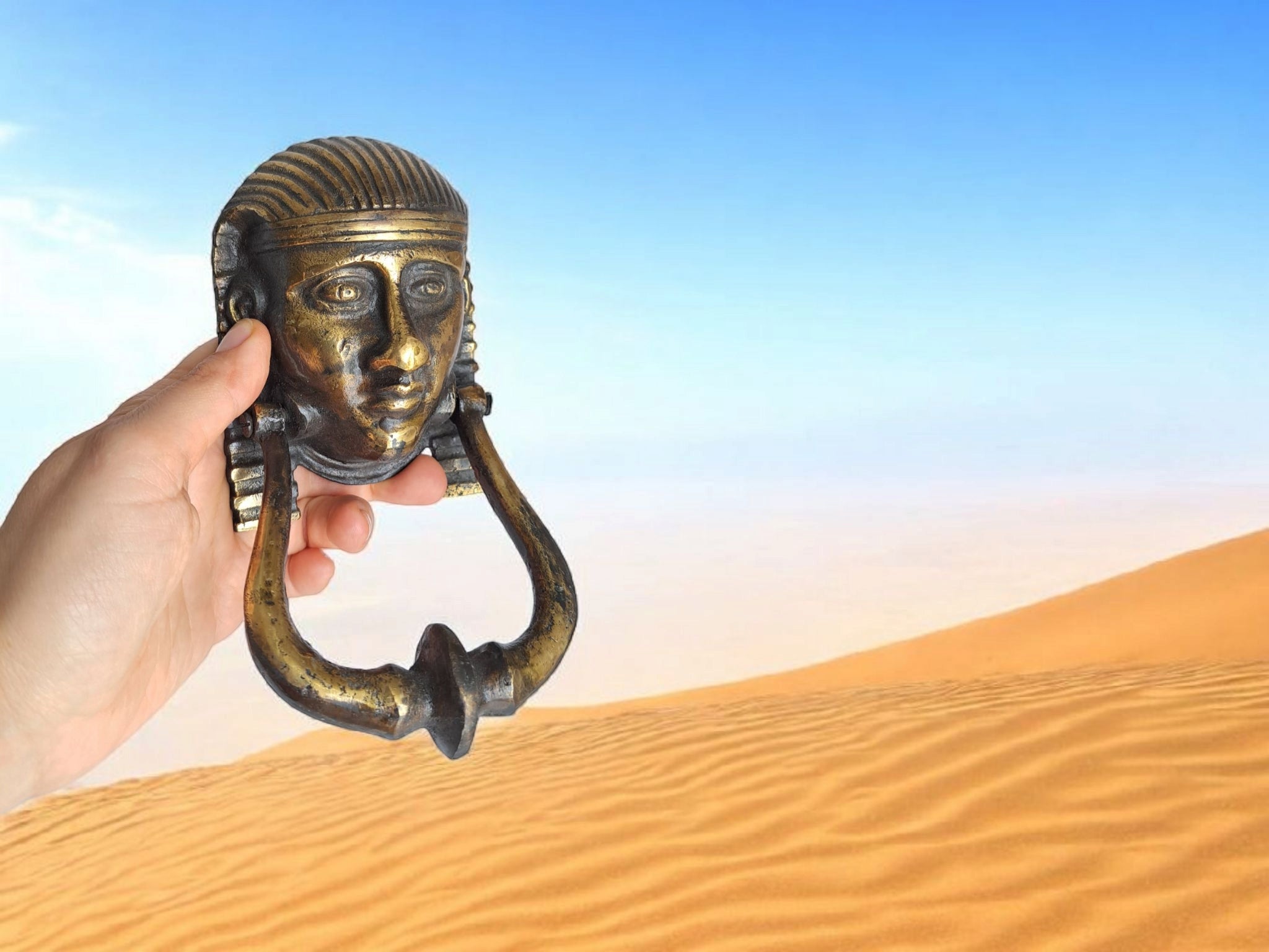 Egyptian-themed bronze door knocker 