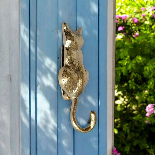 Vintage brass cat door knocker in gold