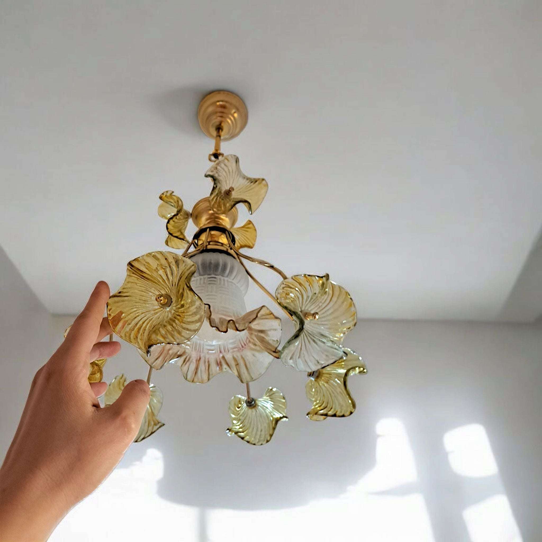 Yellow glass flower chandelier with elegant gold metal frame