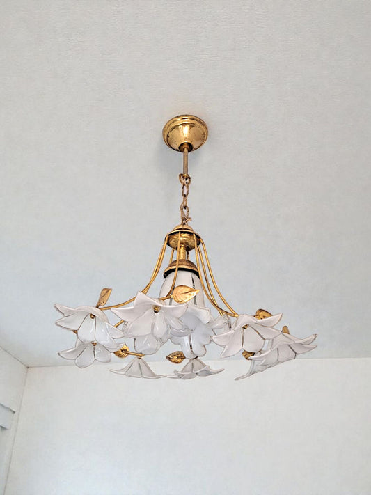 floral glass chandelier with brass arms