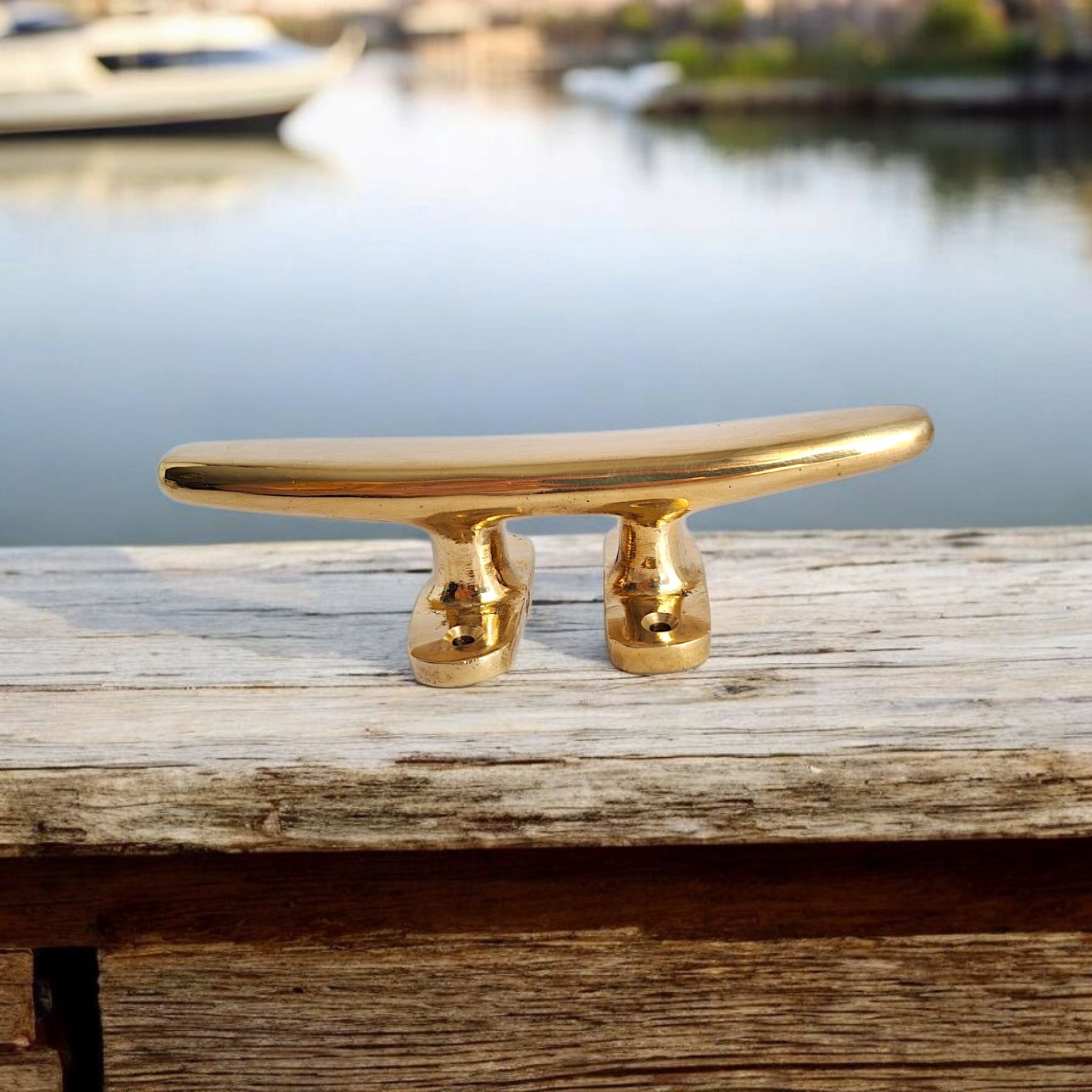 18cm brass cleat on wooden dock surface