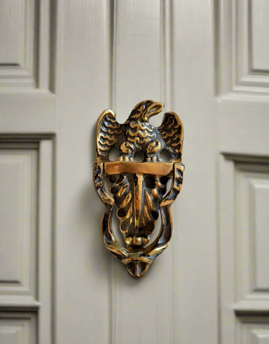 Handcrafted brass door knocker in eagle design, antique gold finish