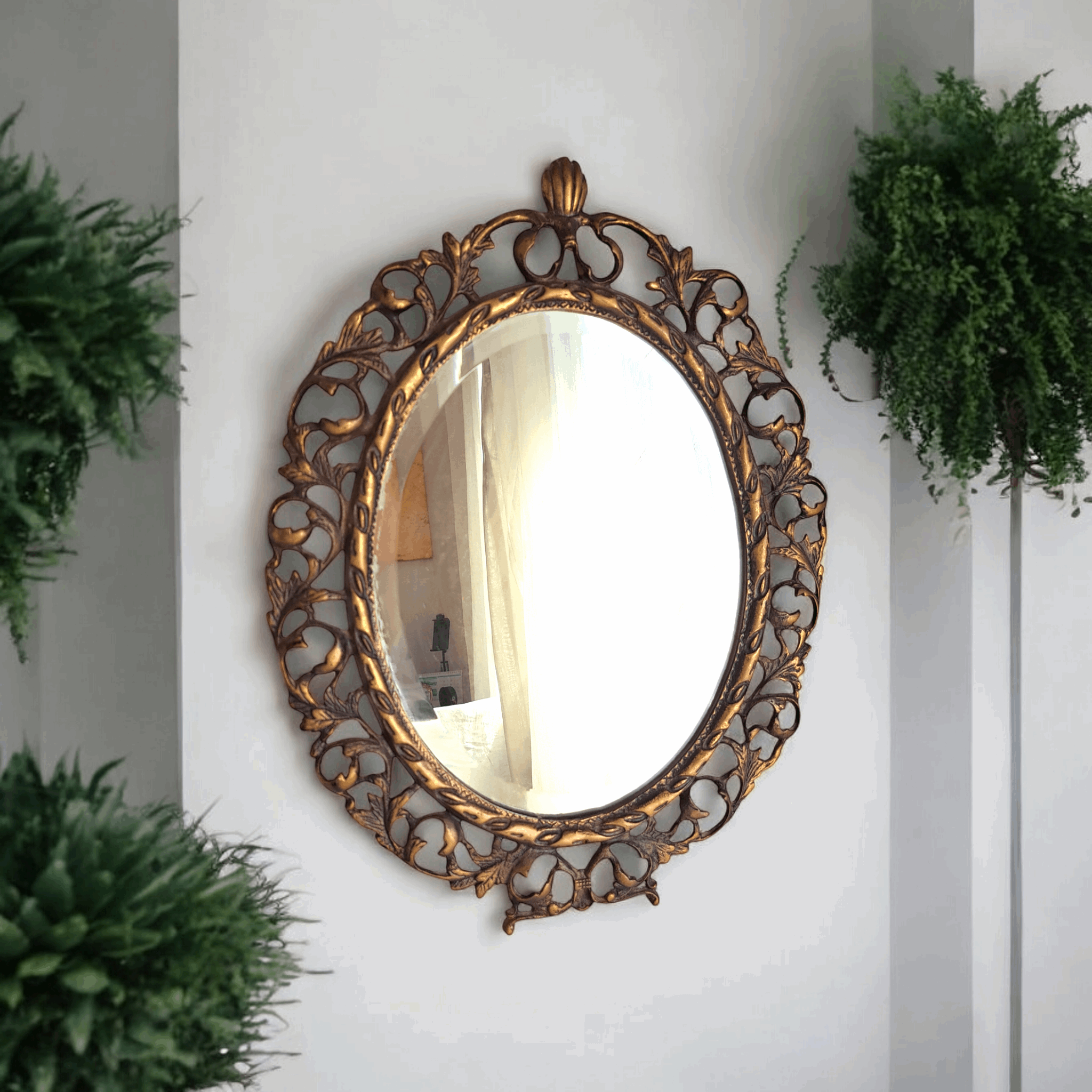 Add timeless charm to your space with this 50-year-old vintage brass mirror