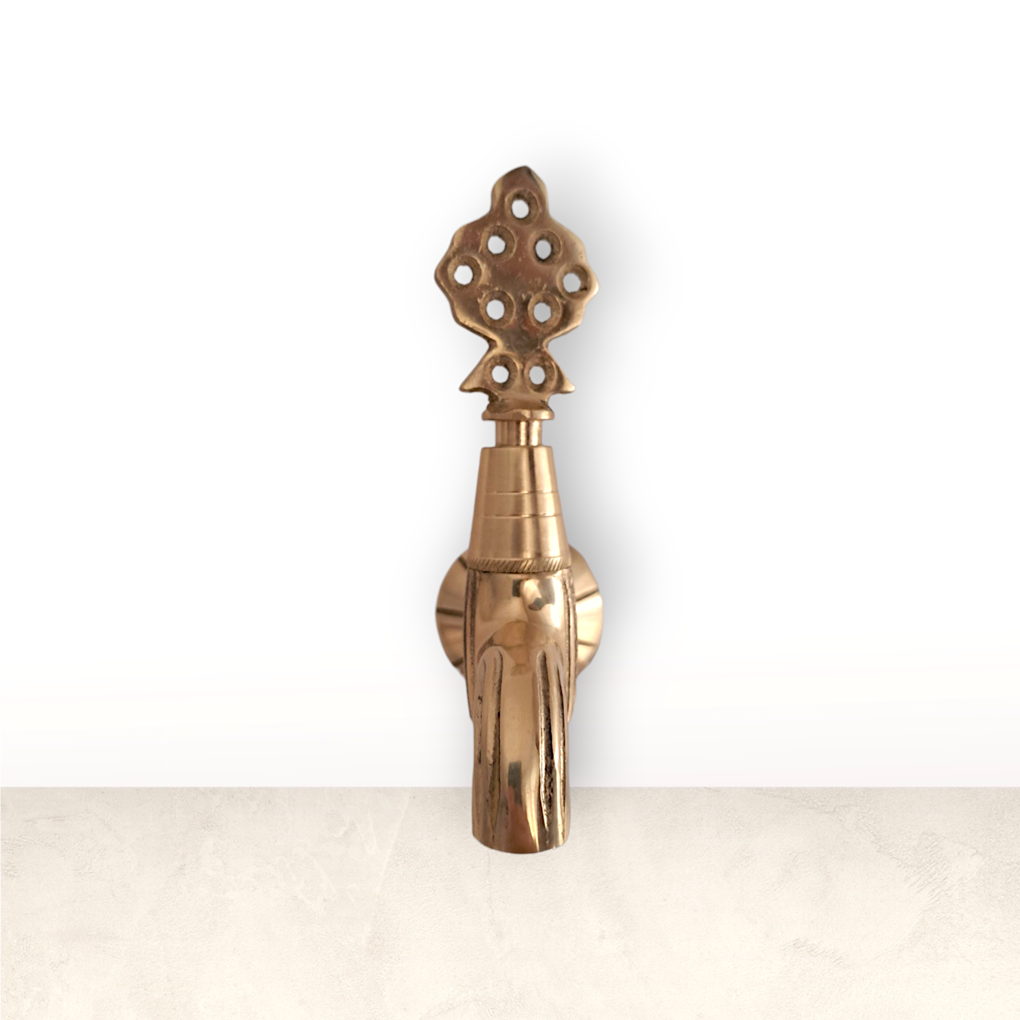 Close-up of an ornate vintage-style wall-mounted tap