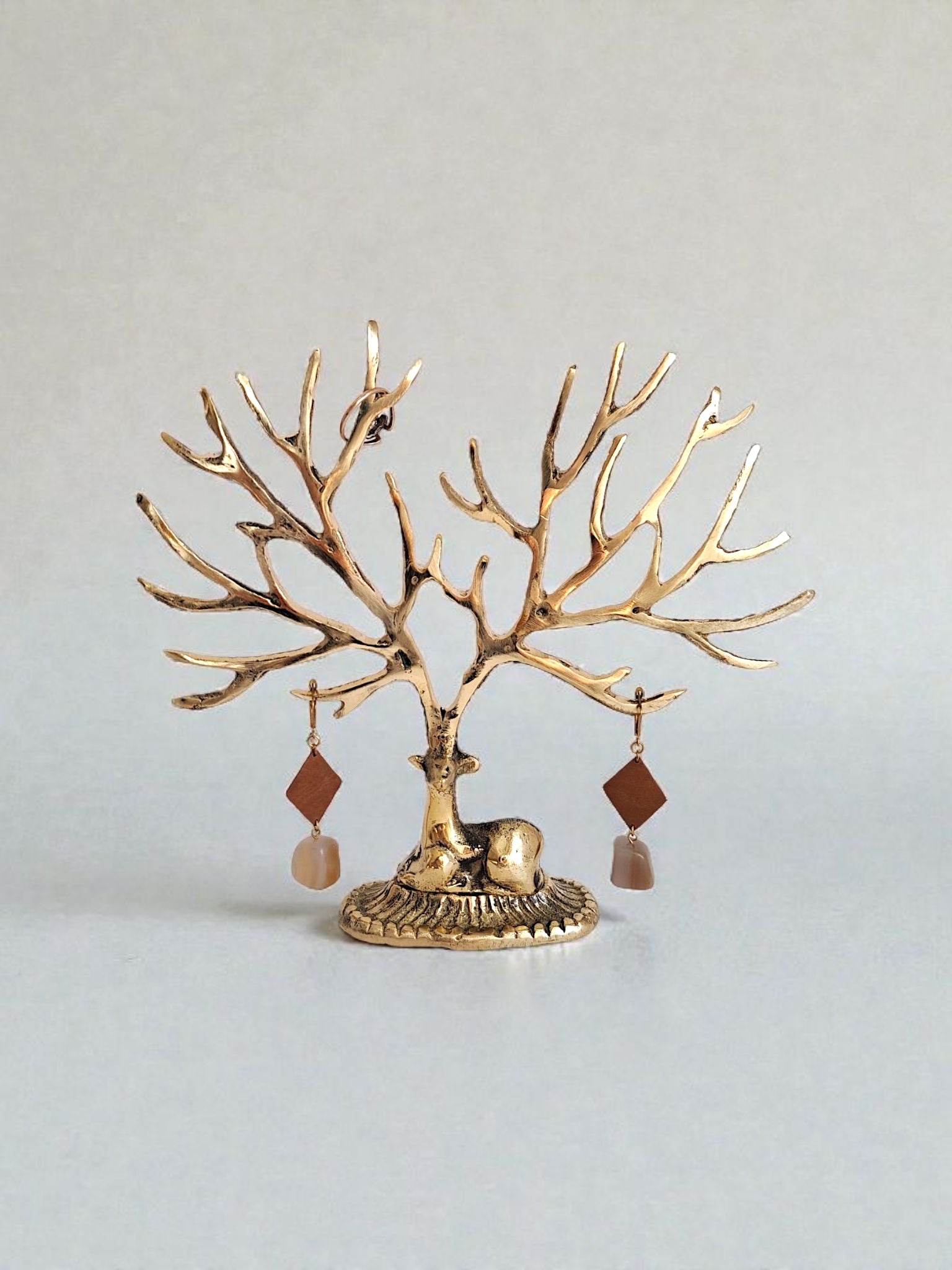 brass deer jewelry stand tabletop view