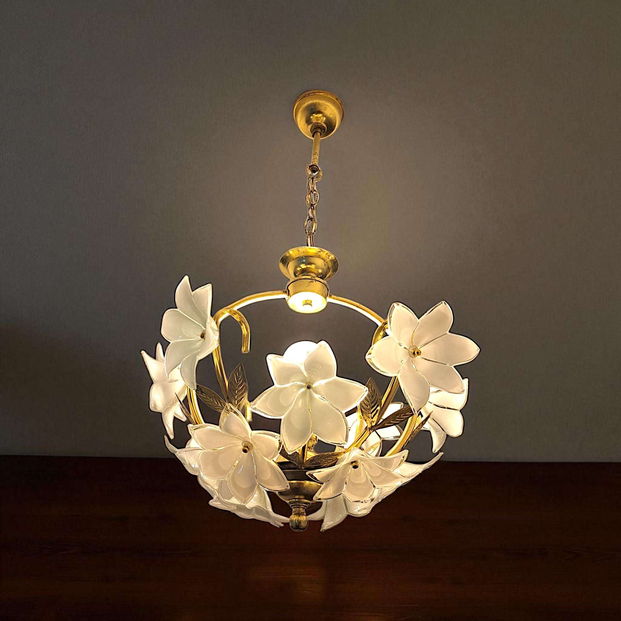 Beautiful vintage-inspired chandelier with glowing glass flowers