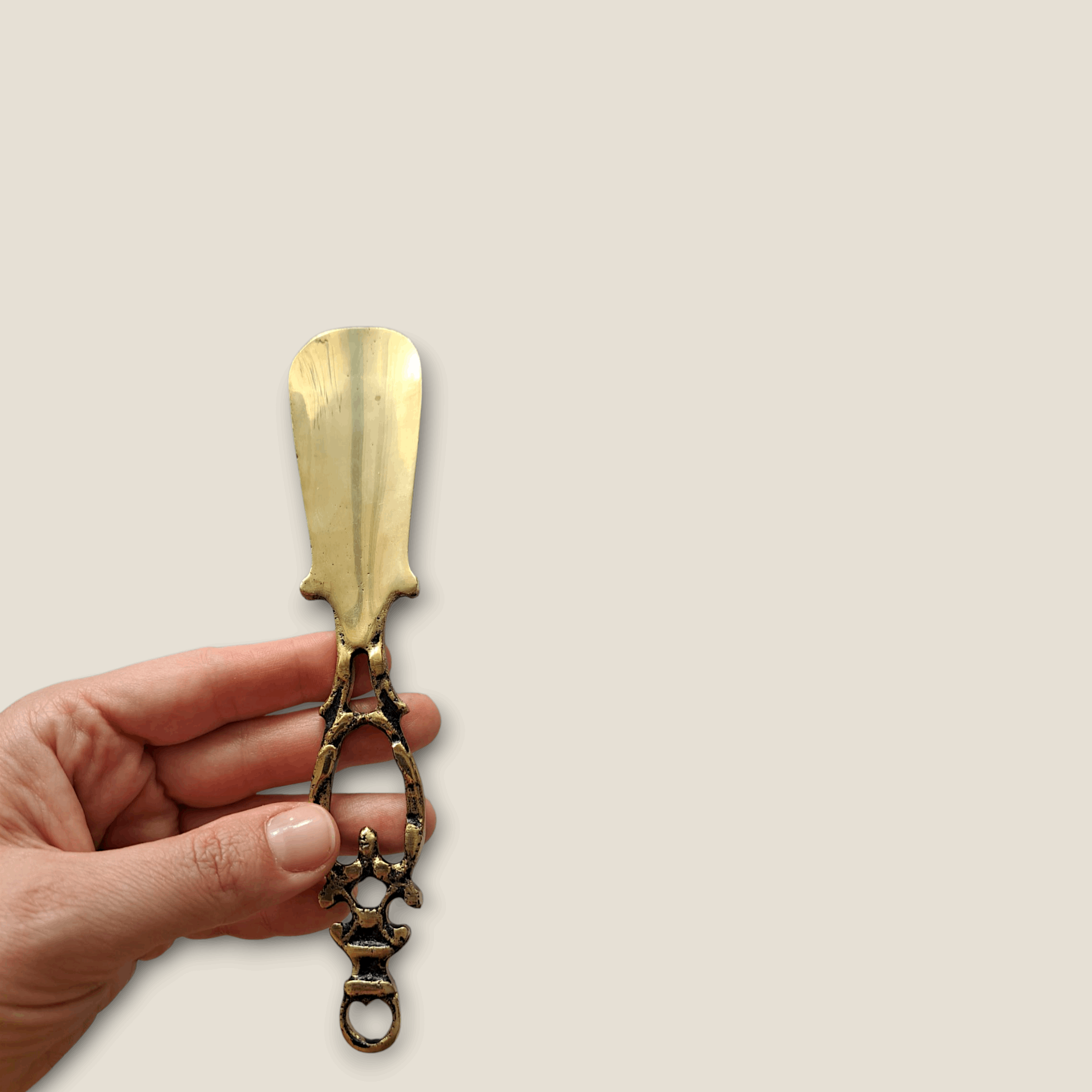 Portable brass shoe horn perfect for travel and daily use